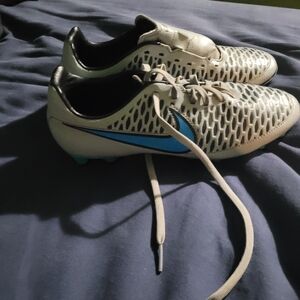 Nike White Soccer Cleats with Blue Swoosh Accent